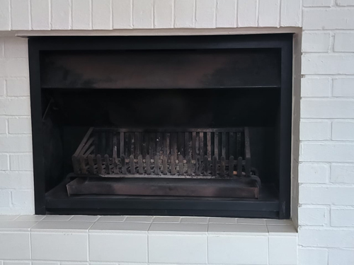 BEFORE - Customer's old existing steel fireplace