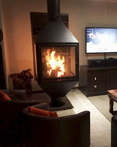 Square fireplace with tapered base